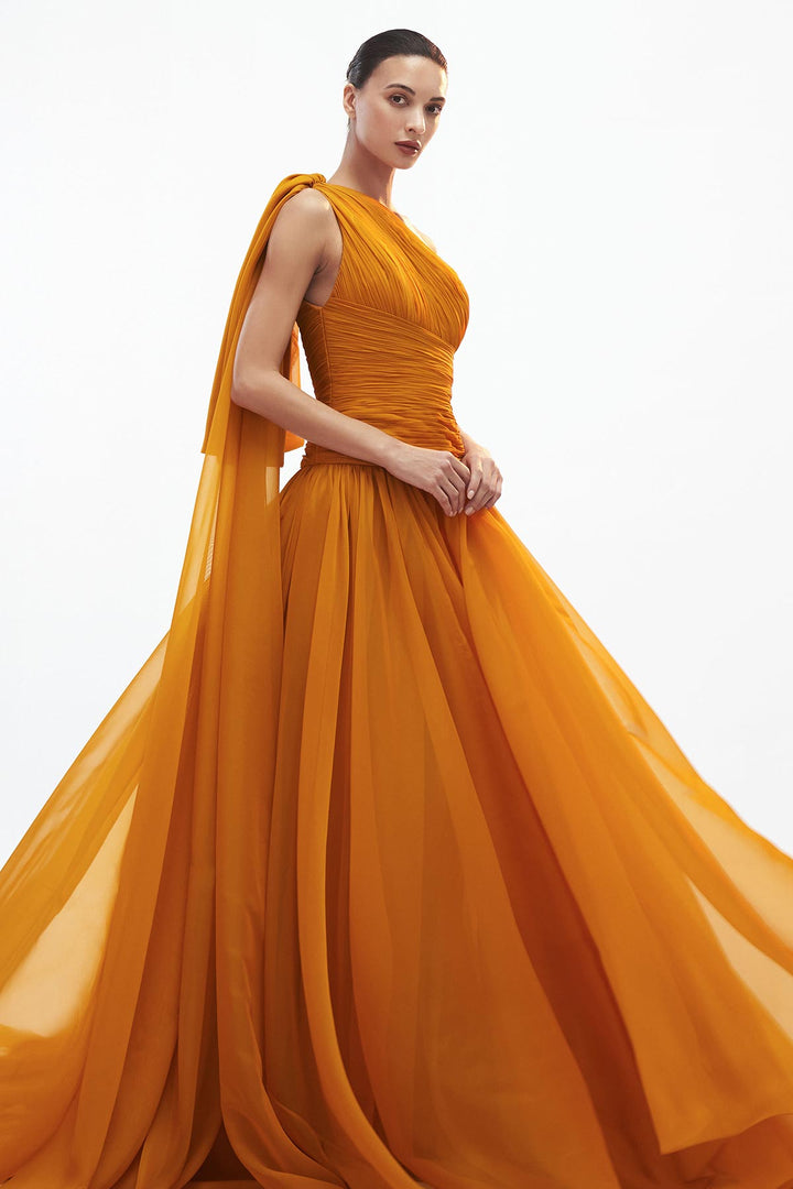 One shoulder drop waisted draped gown with side bow and train